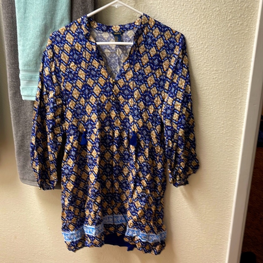 This is a forever 21 dress its very nice meant for a small physique, gently worn